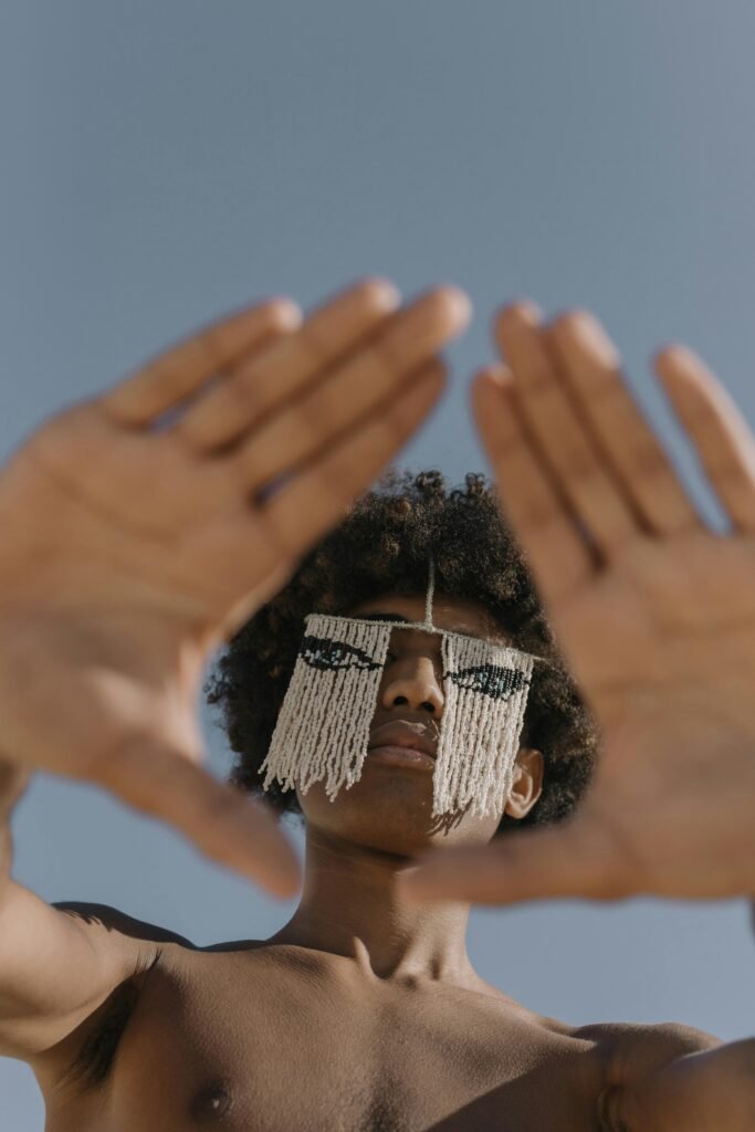 Person framing their face with hands.